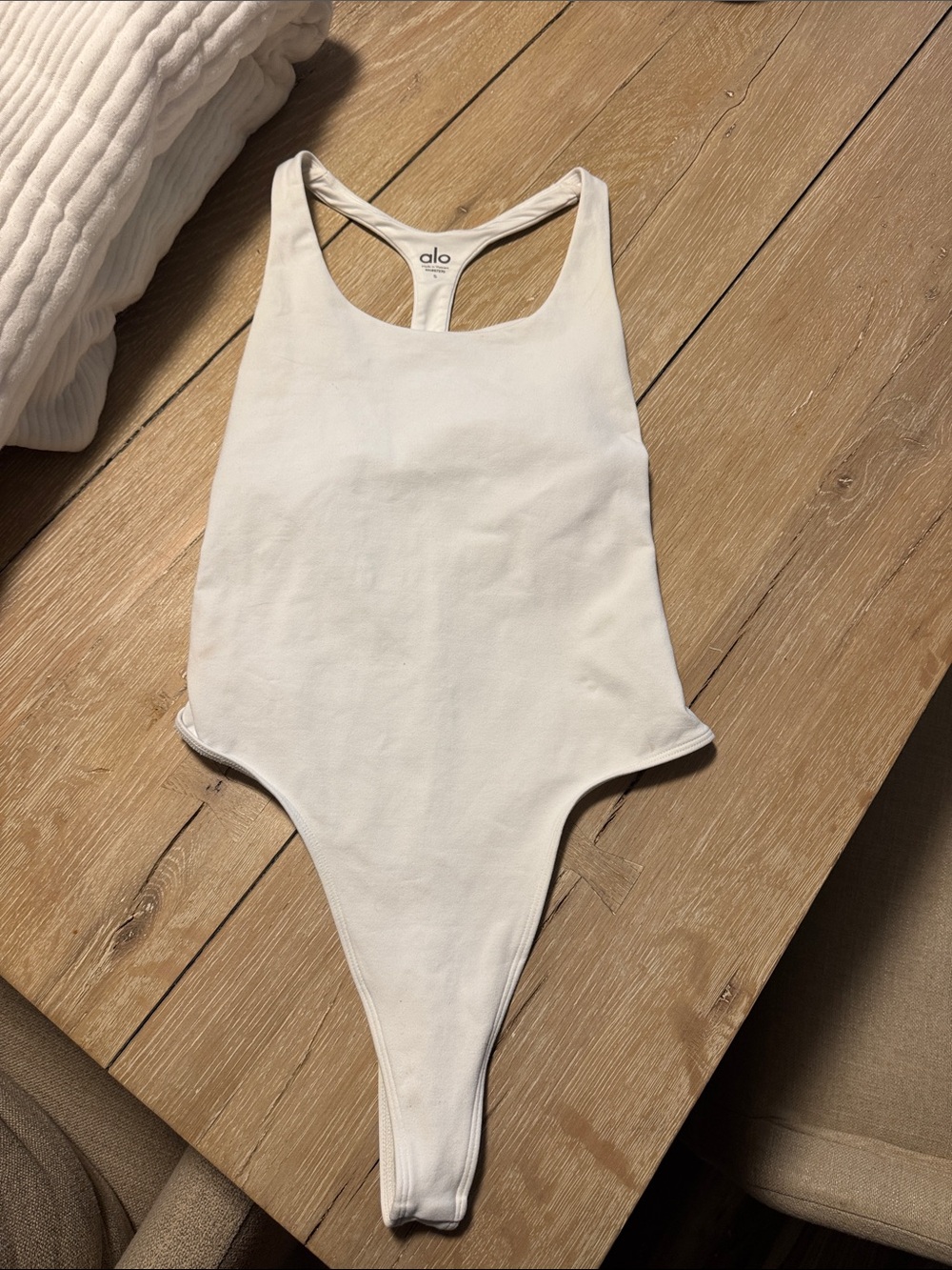 ALO Yoga White Racerback One-Piece Bodysuit